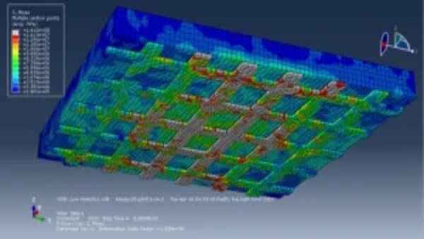 Low-velocity impact simulation of reinforced concrete slab with CFRP strips in Abaqus